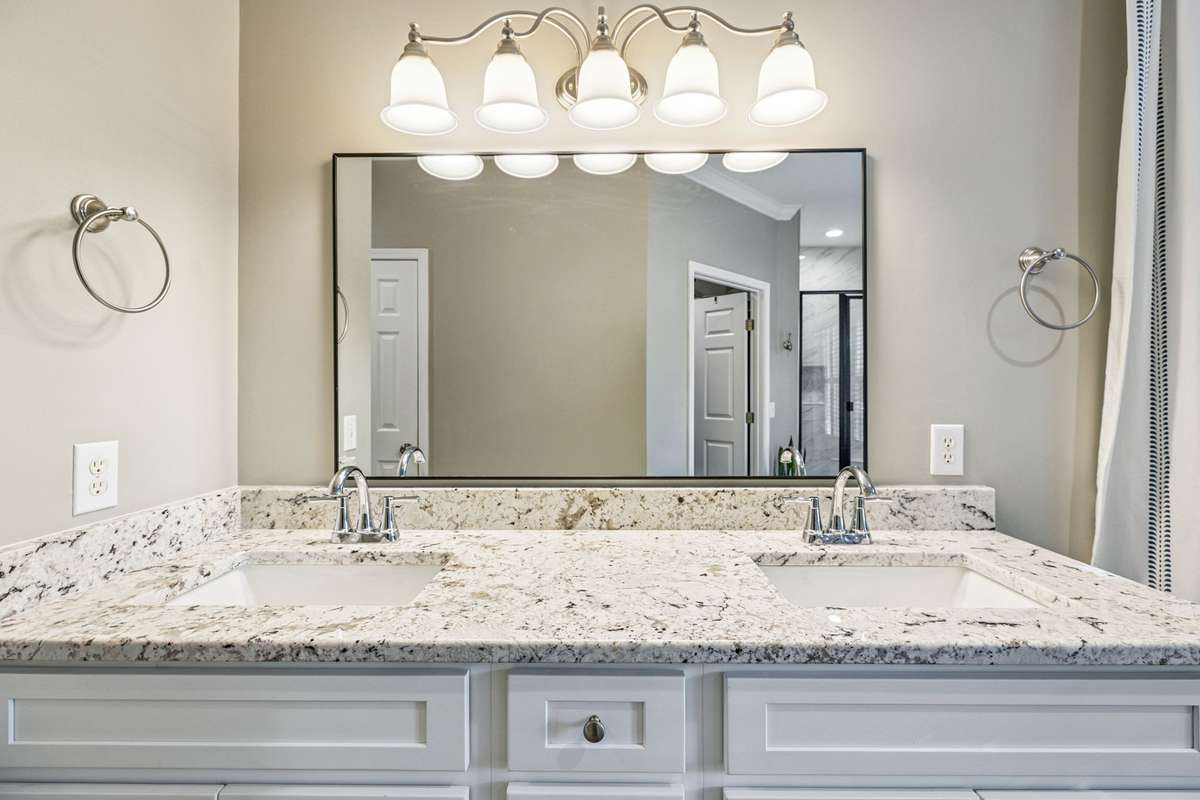 The new double vanity has granite counter tops