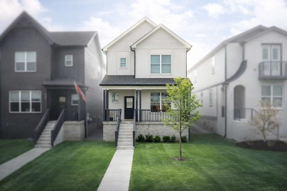 Photo has been enhanced for presentation. Landscaping and tree foliage may vary seasonally.