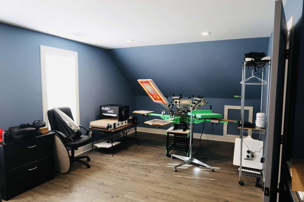 Upstairs bonus room with accent wall.