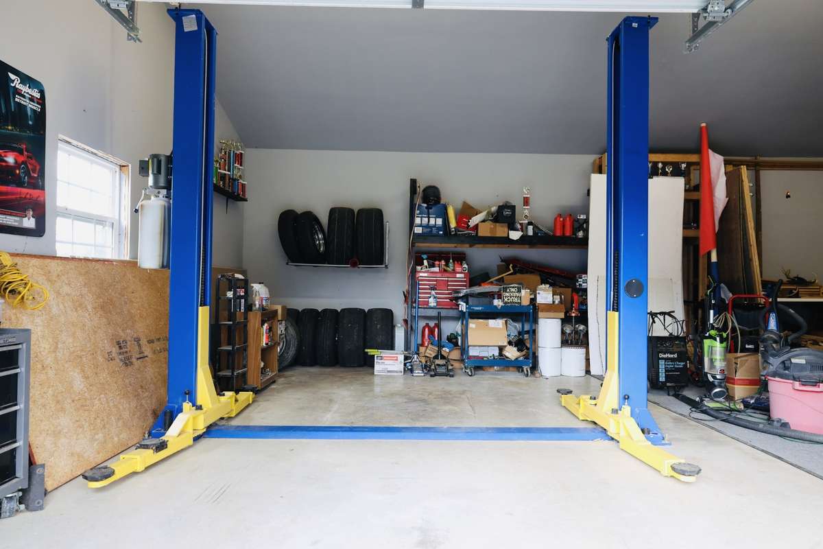 Car Lift in detached garage.