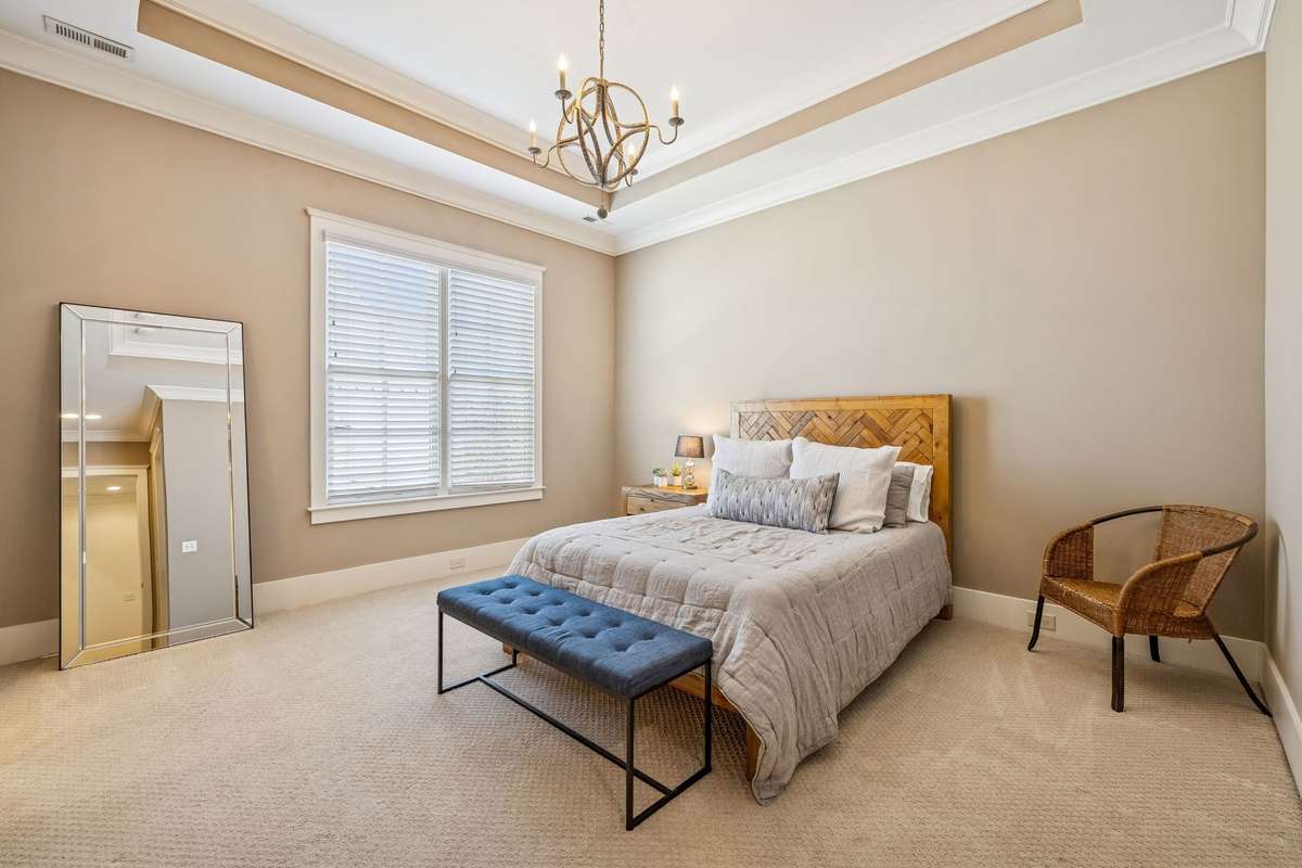 Bedroom 2 upstairs with full bath and walk-in closet