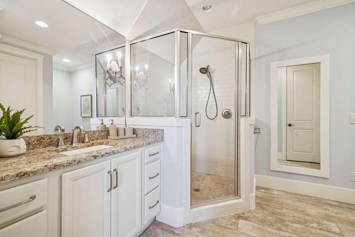 Full bath with large walk-in closet