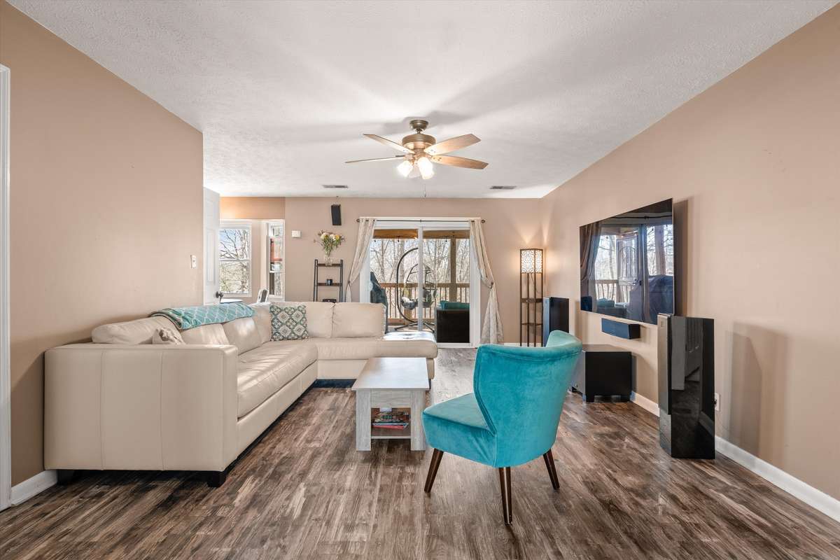 Spacious great room.  Note new floors.