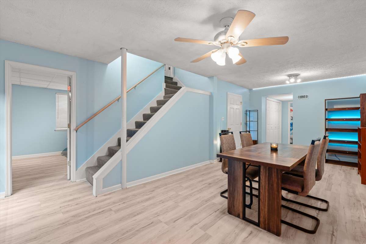Let's explore the many features of the lower level: game or party central? dining? homeschool? hobbies?