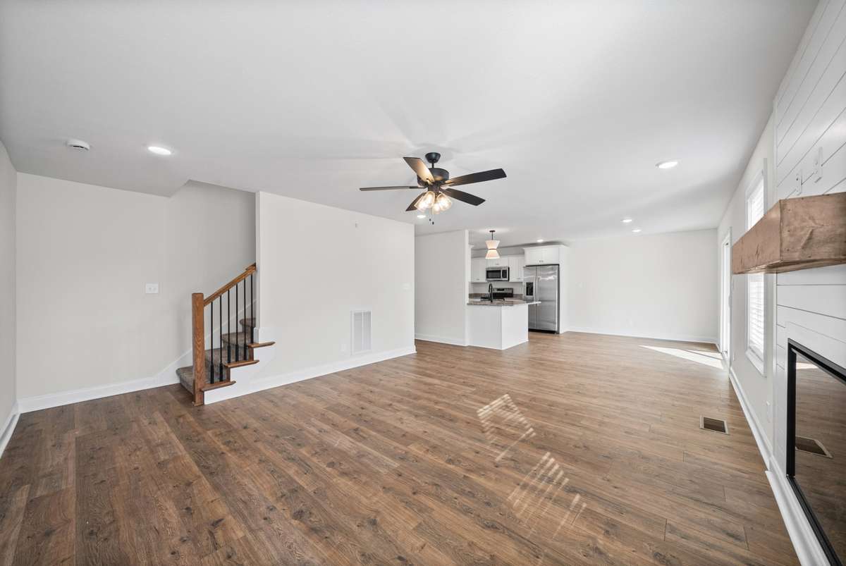 Opens to kitchen and eat in area.