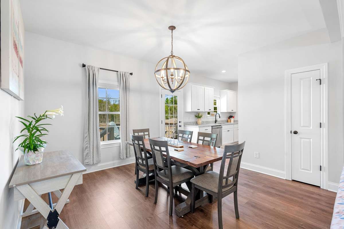 Dining Room- door to the left can be used as linen closet or kitchen pantry.