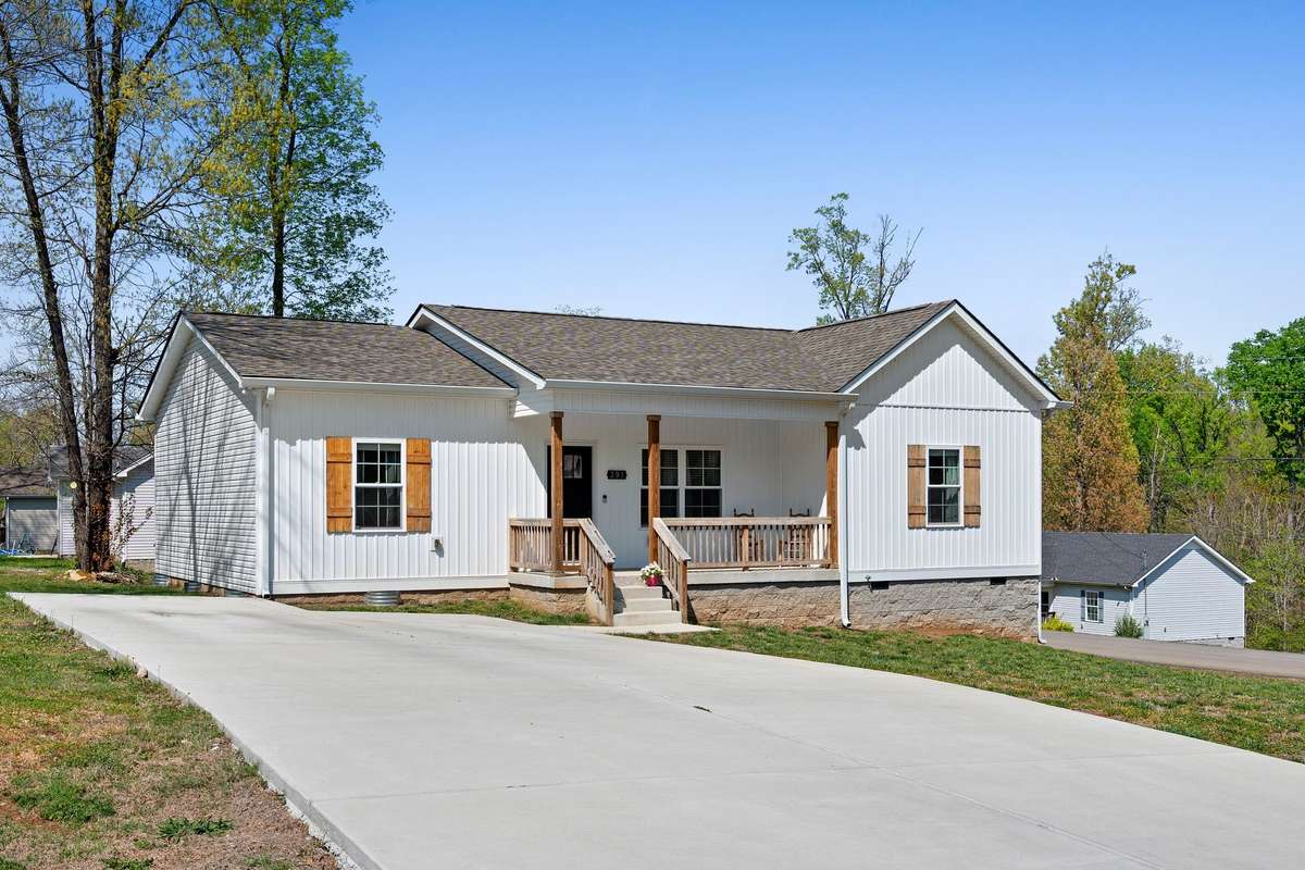 Concrete double driveway added by current owners July 2024 to allow for more guest parking.