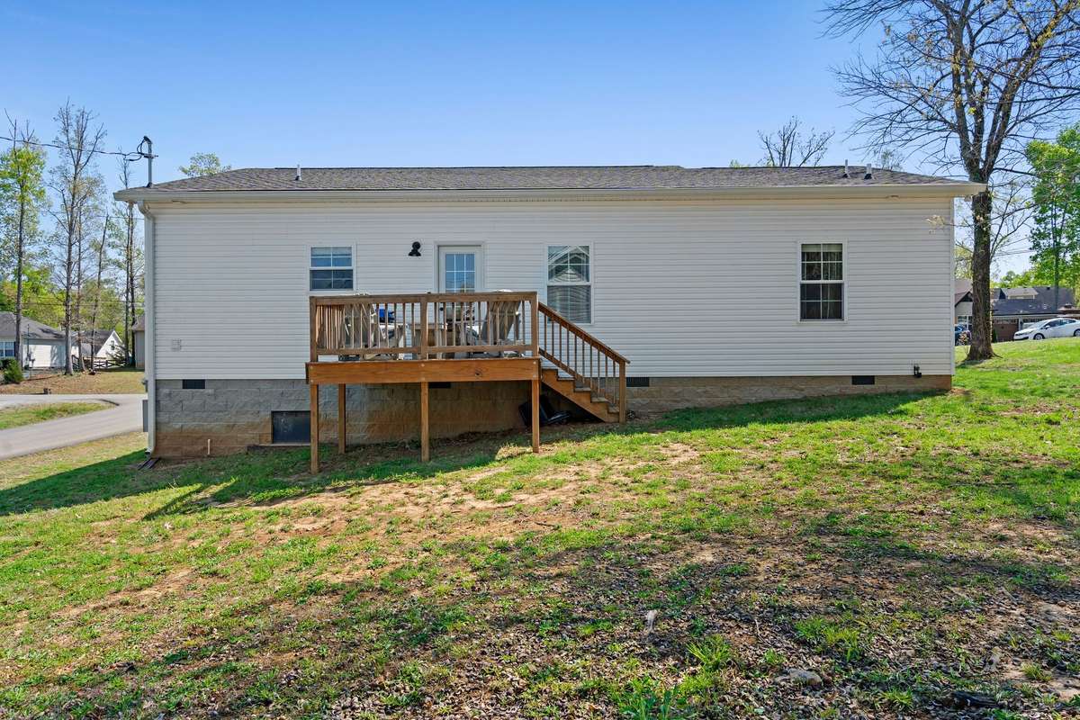 View of back of the house and the back deck.