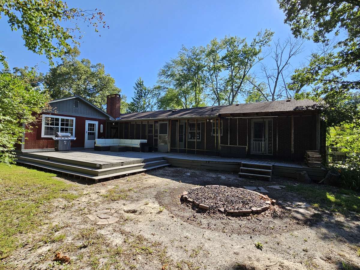 ...including a large deck and convenient firepit...