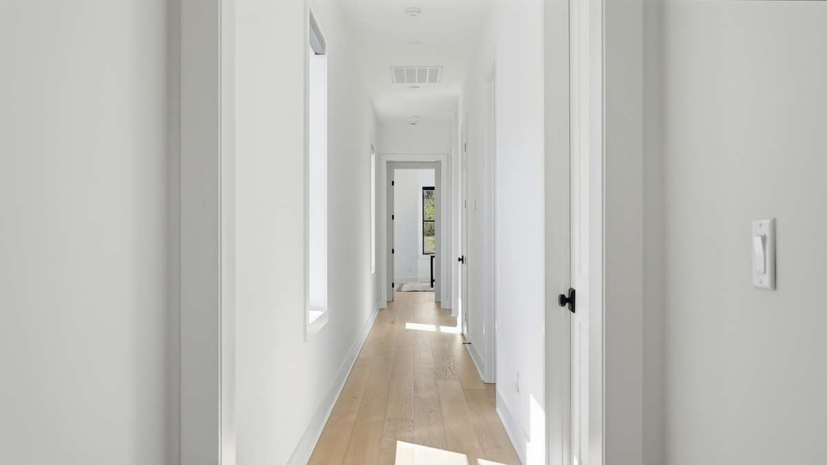 Upstairs hallway with tons of sunlight