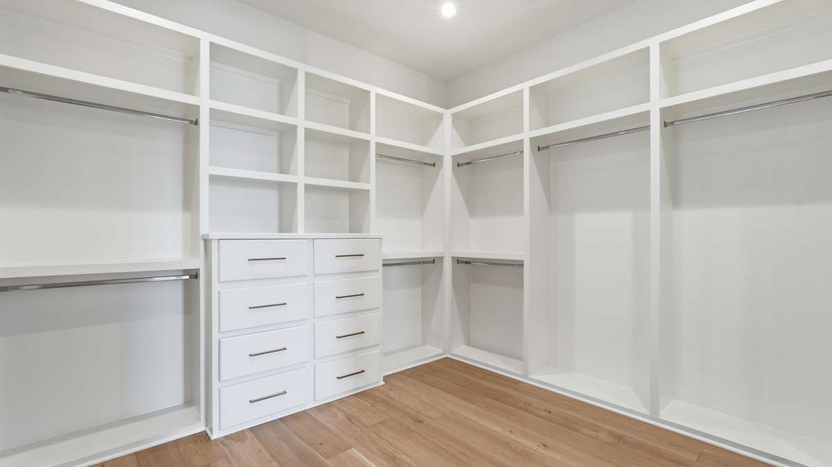 Primary closet with custom built ins
