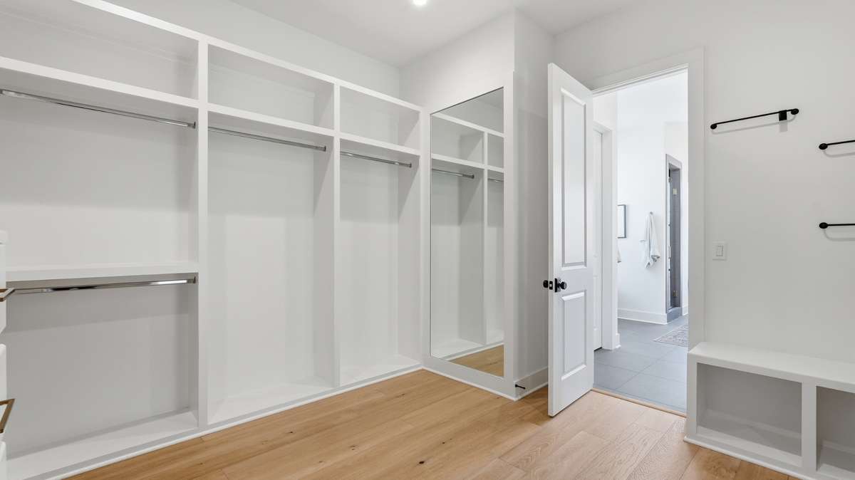 Primary closet with custom build ins