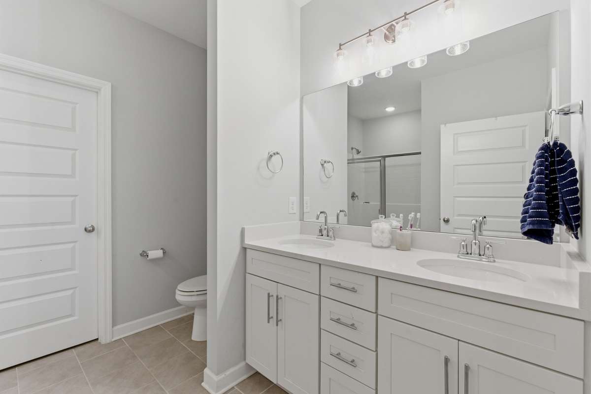 Great size ensuite bathroom with double vanities