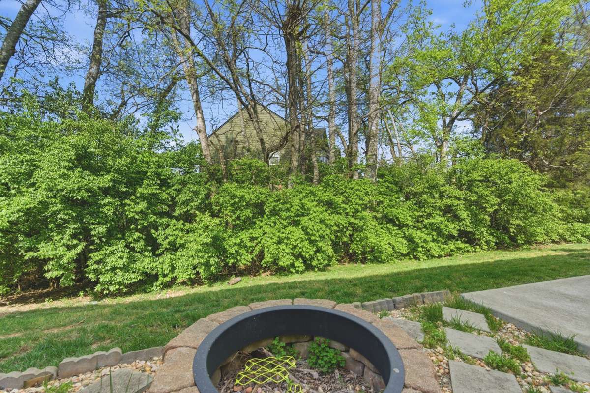 Private backyard with custom fire pit