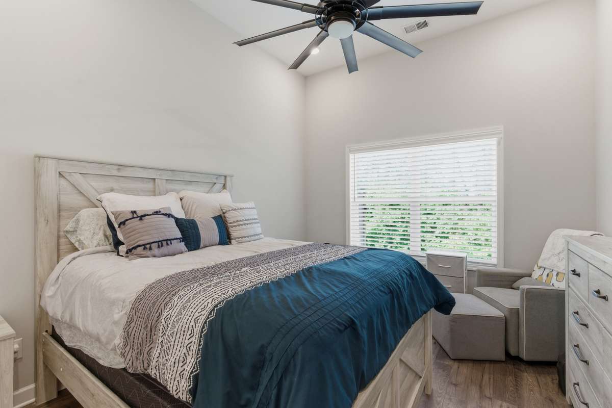 First floor primary bedroom - with backyard views