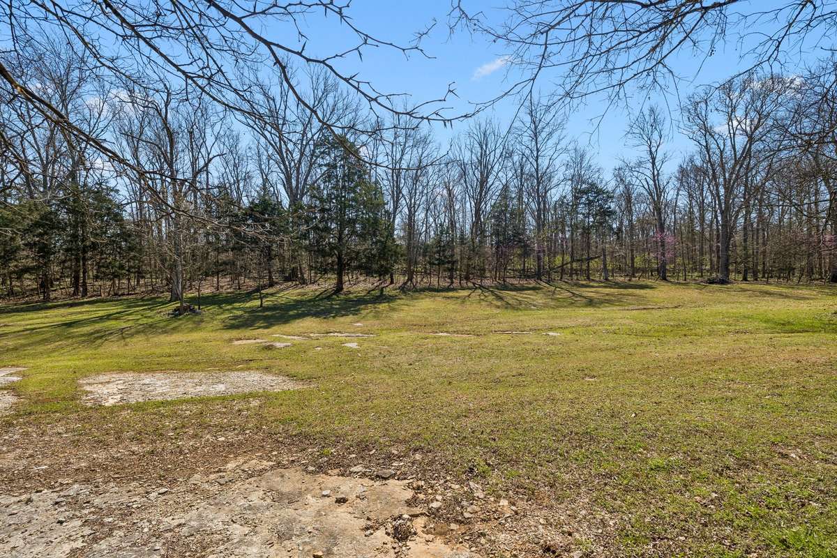 Seventeen wooded acres provide complete privacy with room for trails, hunting, or just enjoying the peaceful sounds of nature.