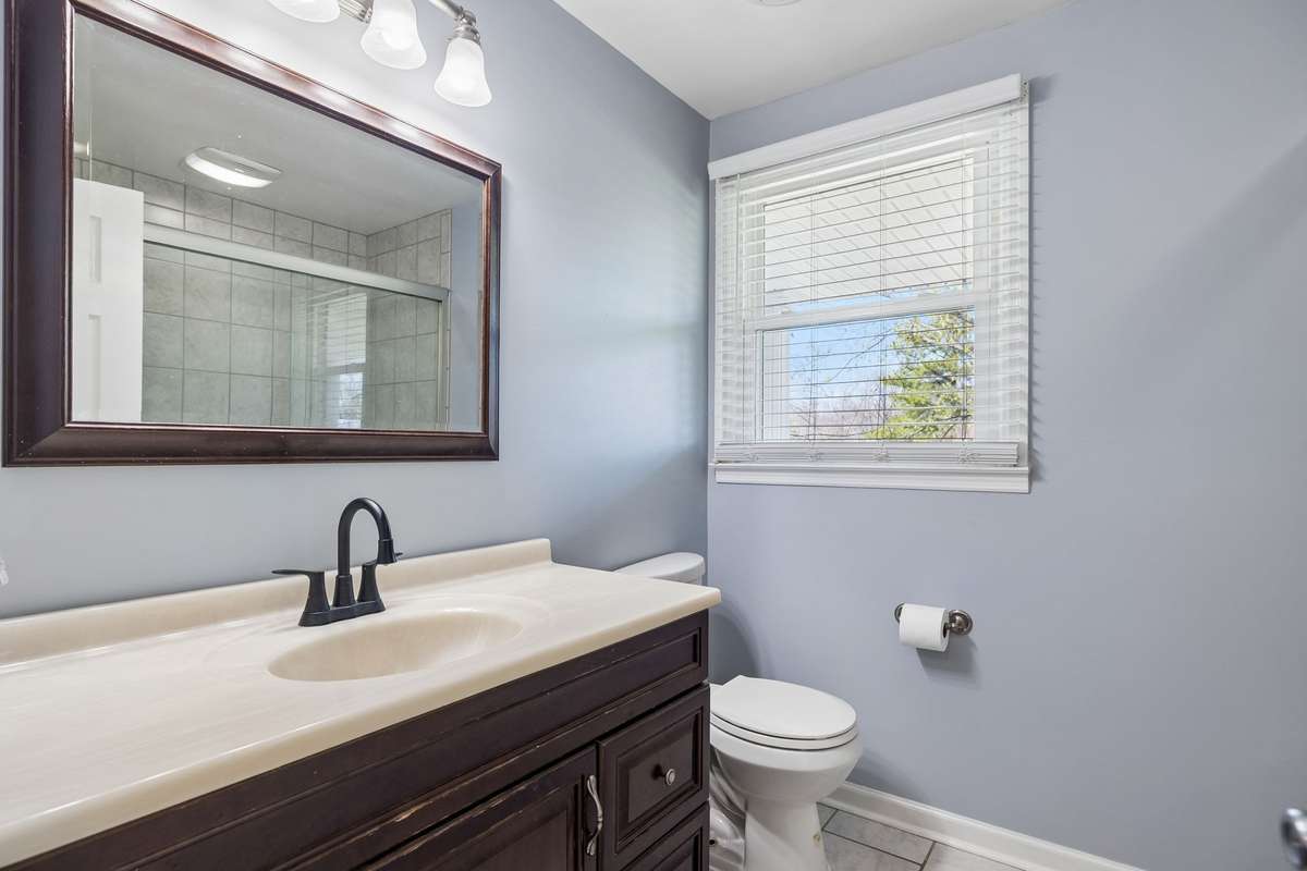 Modern upstairs hall bath.