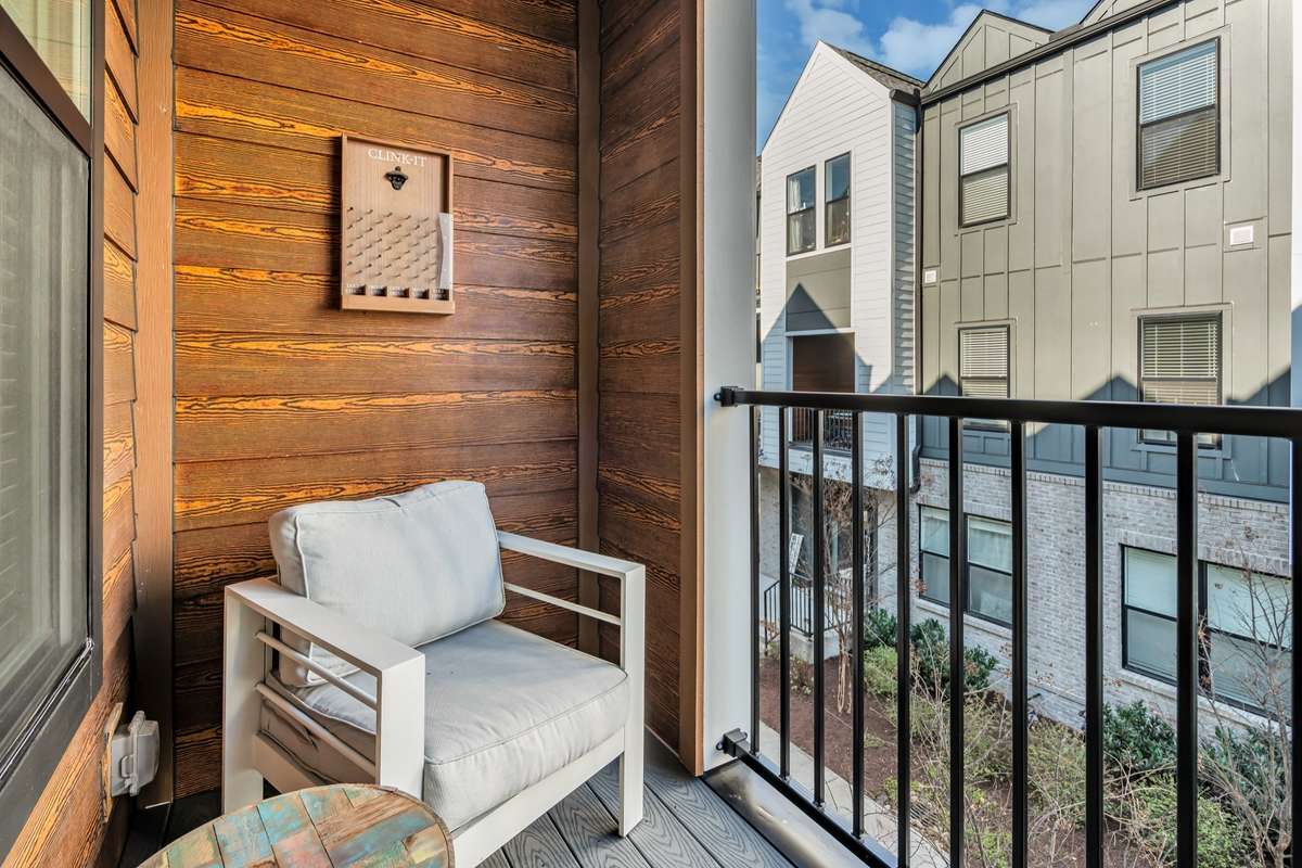 Balcony space off of the living room for your morning cup of coffee!