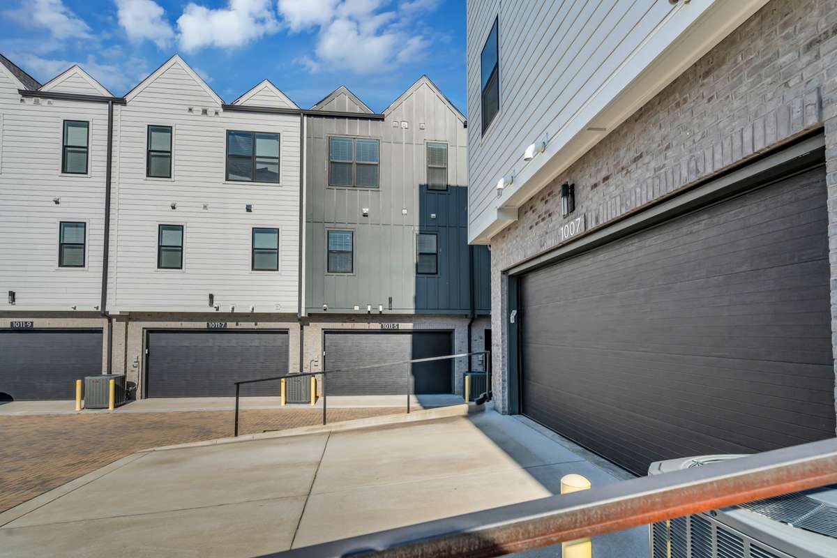The rear two car garage also has room for guests to park outside of the garage when entertaining. There is also guest/street parking nearby.
