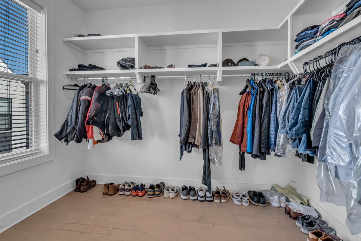walk-in closet has space for additional storage, dressers, etc.