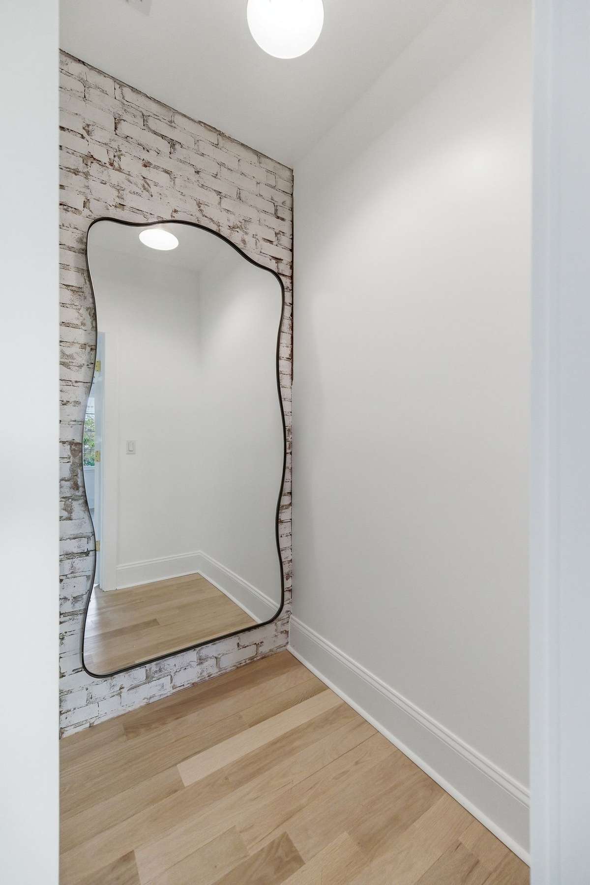 exposed brick closet, with the old and the new