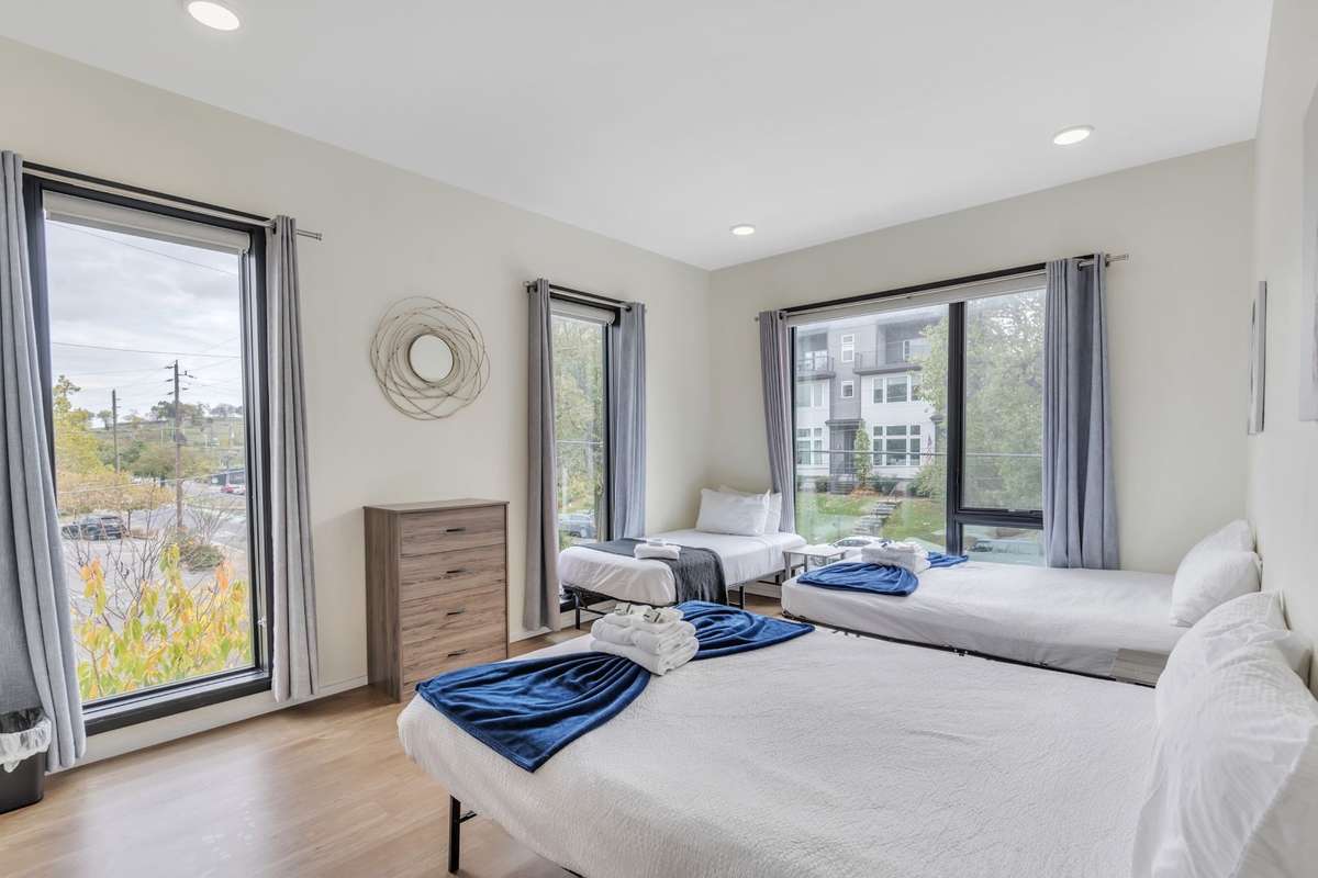 Primary bedroom with corner windows and great views.