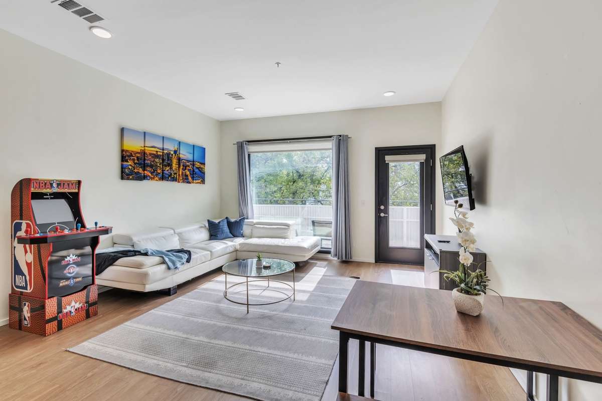 Eat-in dining table accompanies seating at the kitchen bar, making hosting easy