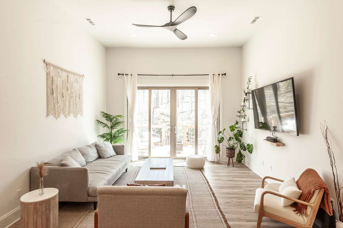 Modern ceiling fans have been added to the living room and all three bedrooms for extra comfort and style.