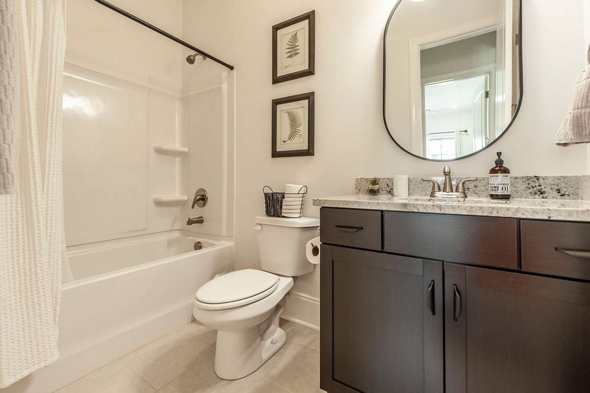 Here's a look at the secondary bathroom, perfectly located for guests or anyone using the secondary bedrooms!