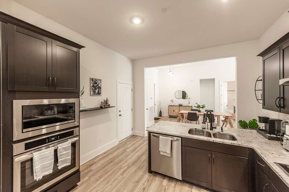 You'll notice a wonderful natural flow in this home - from kitchen, to dining, to living - all open and bright, welcoming guests and providing comfortable living alike!