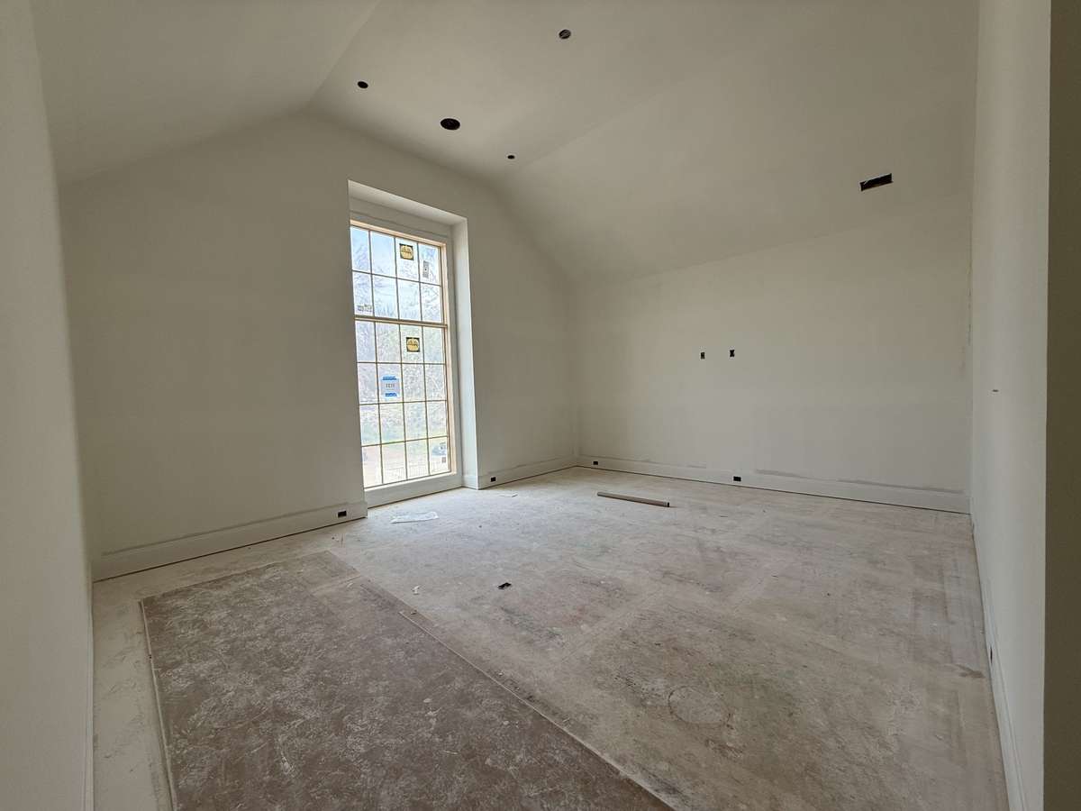 One of the two massive bonus or rec rooms. This home is currently under construction. Images represent current progress and are subject to change.