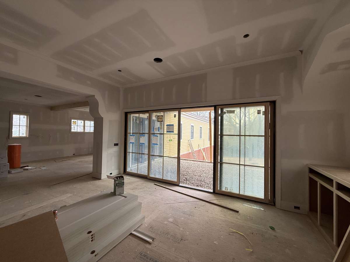 Oversized covered patio with lots of light flooding into the great room and dining ,This home is currently under construction. Images represent current progress and are subject to change.