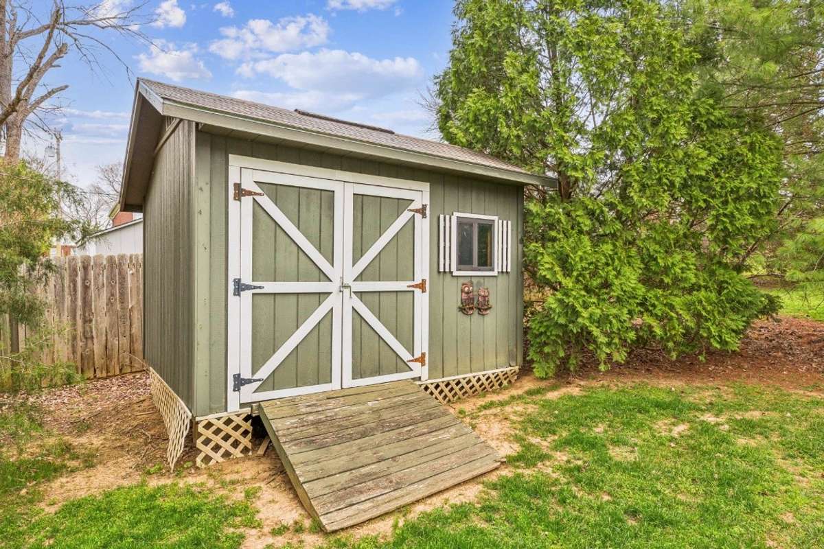 Storage shed with attic storage