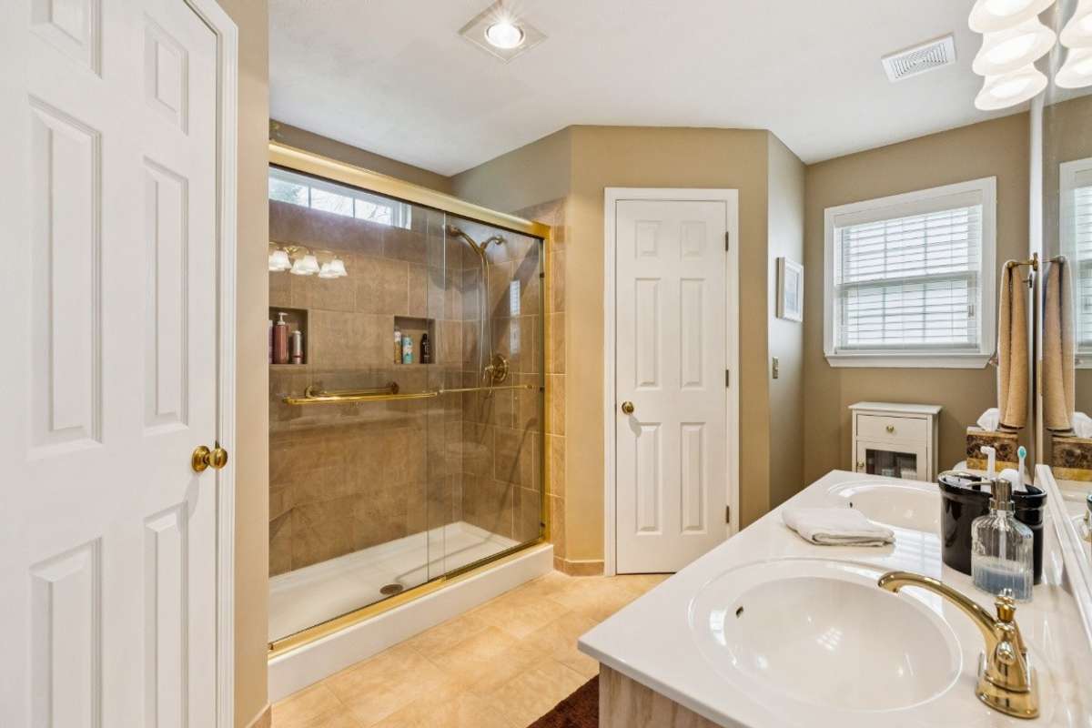 Nice walk in shower with double vanities