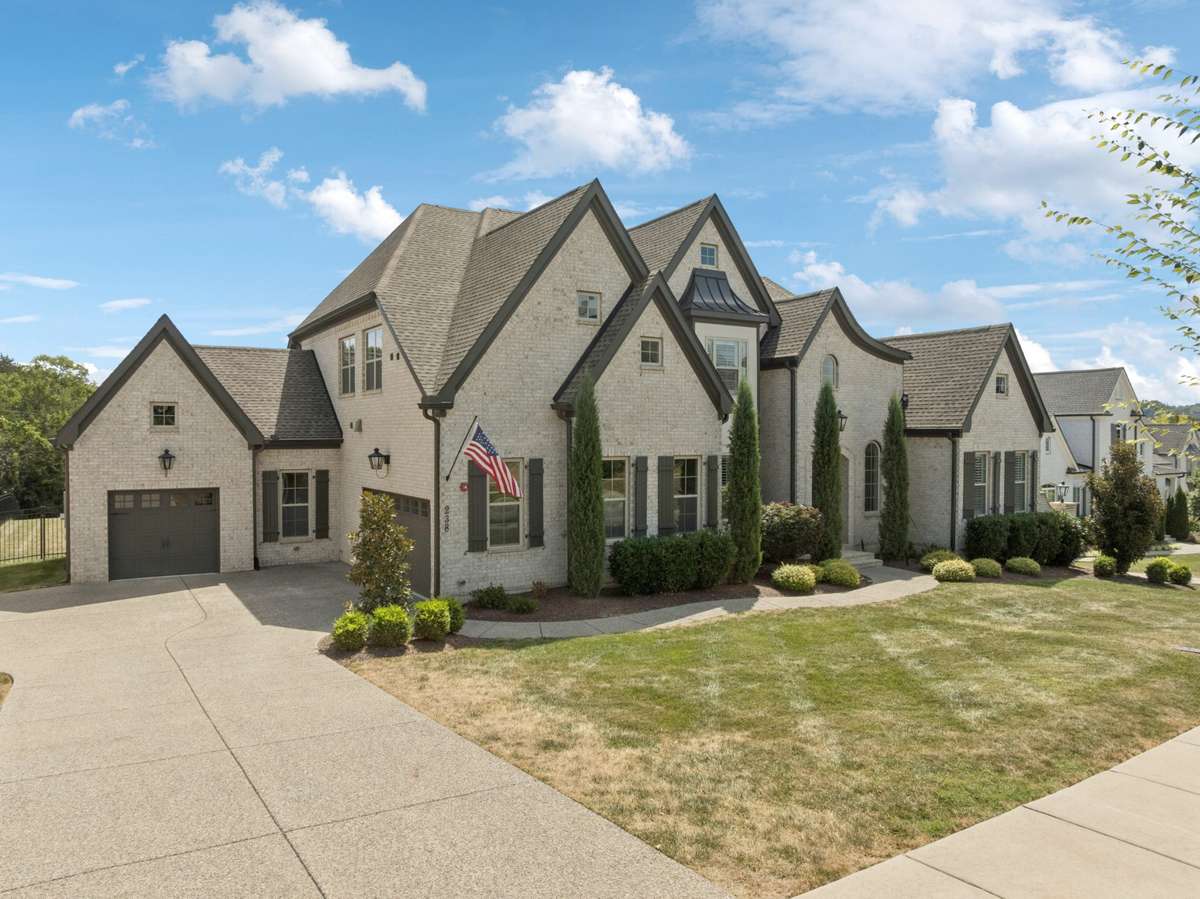From its stately brick exterior to its beautifully designed interiors, this home offers a seamless blend of elegance and everyday comfort.
