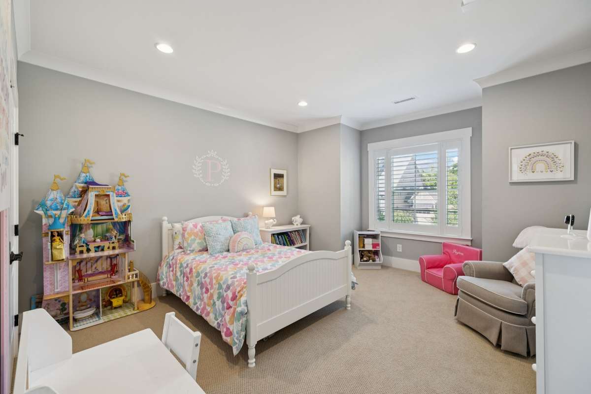 Upstairs, each additional bedroom includes its own en suite bath, while a generous bonus room provides flexible space for a media room, playroom, or fitness room.