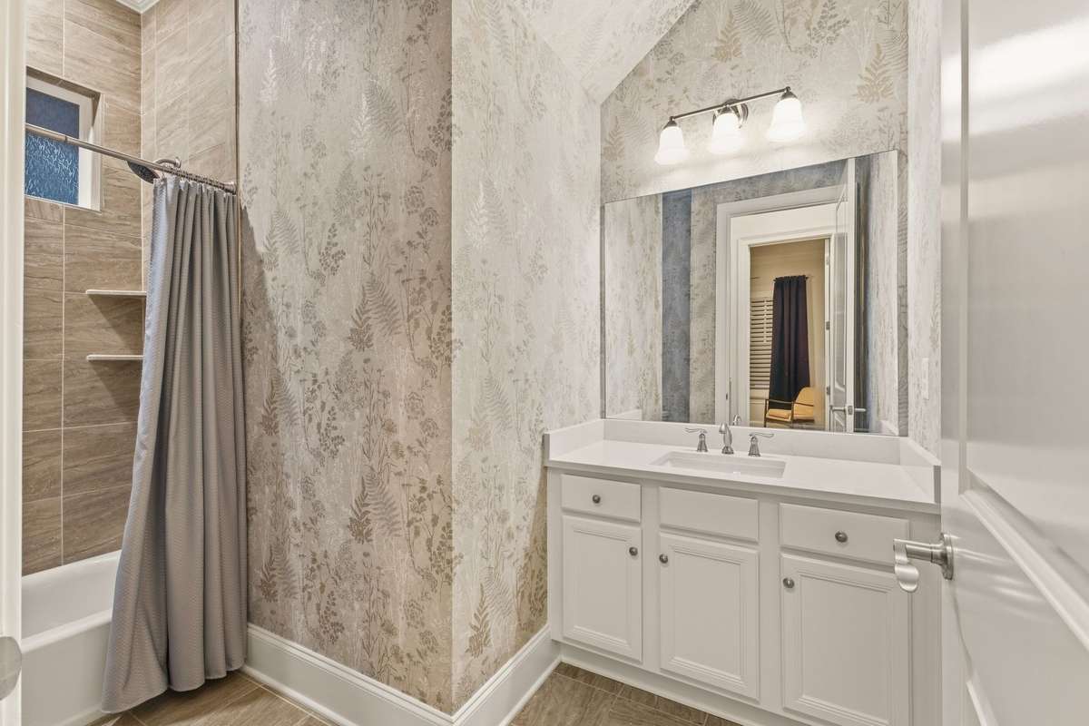 Full bath directly across from the office/guest room.
