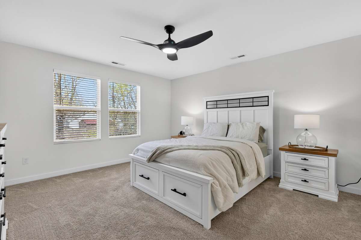 The primary bedroom is HUGE AND SO IS IT’s  CLOSET! The beautiful owner’s suite gives off a serenity feel of peace and relaxation! Overlooks the private back yard and trees!