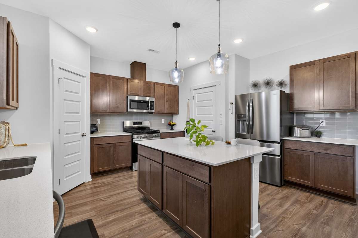 The kitchen is equipped with a high quality refrigerator, dishwasher, stove and microwave! All appliances remain!