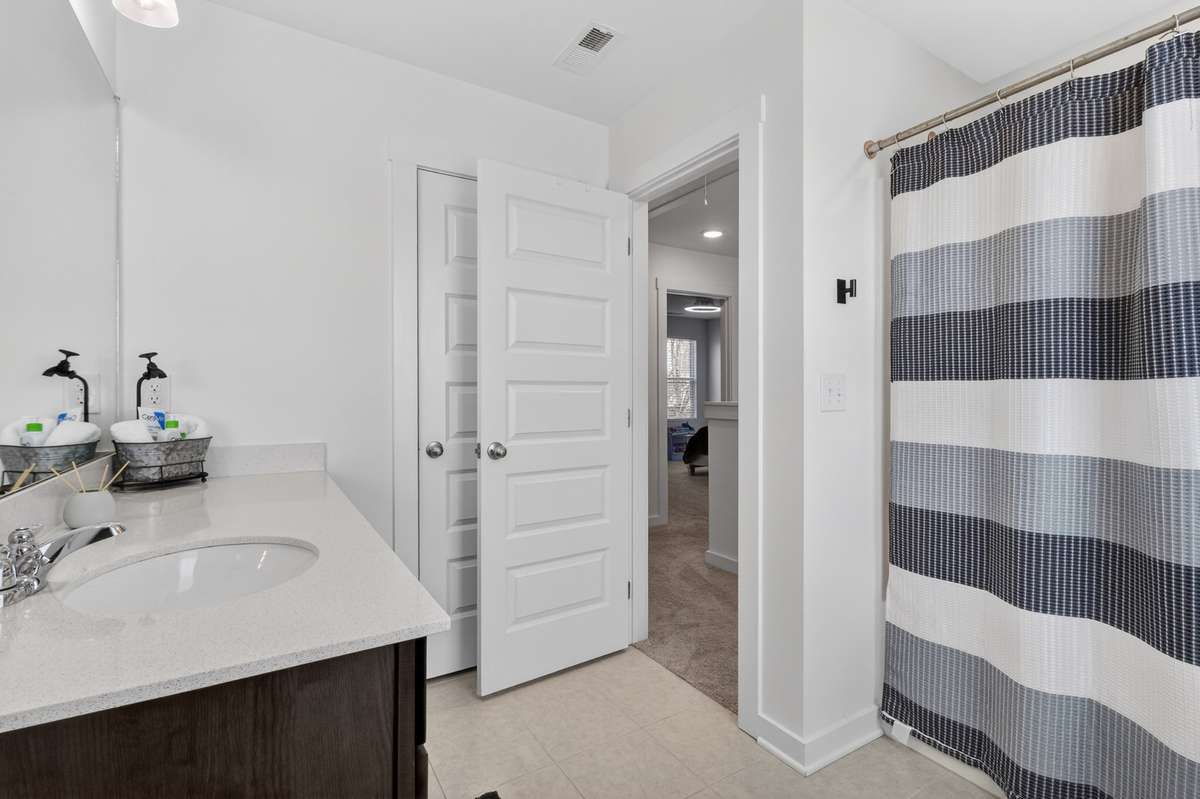 Upstairs bathroom with large linen closet!