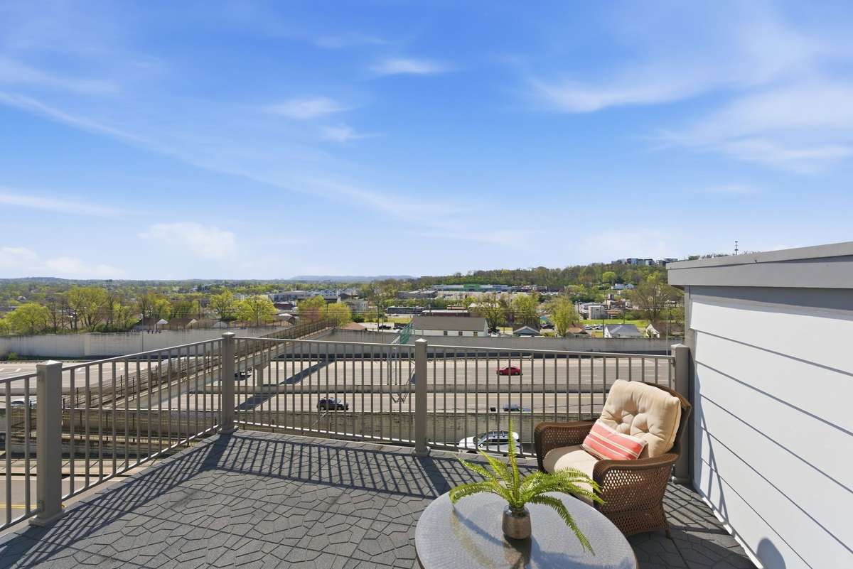 Enjoy the incredible views of the downtown area from the top balcony, while you sip your favorite beverage on a warm summer day