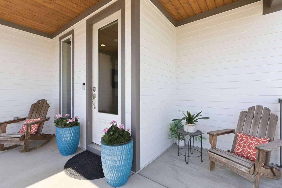 You'll love this beautiful front porch, perfect for relaxing with a cup of coffee in the morning