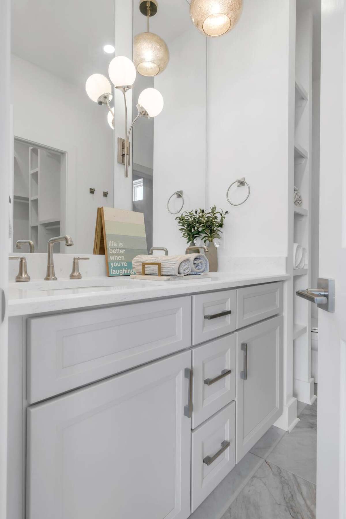 Photo shown is not of actual unit but of a similar unit in the same development- Photo for the purpose of showing quality and caliber of work only-Floorplan is different.