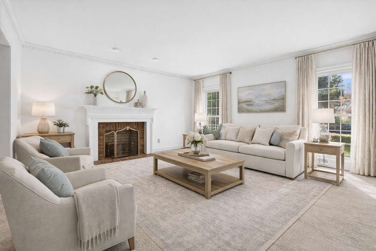 Photo is virtually staged with drapery and furnishings. Please see next photo for present condition.