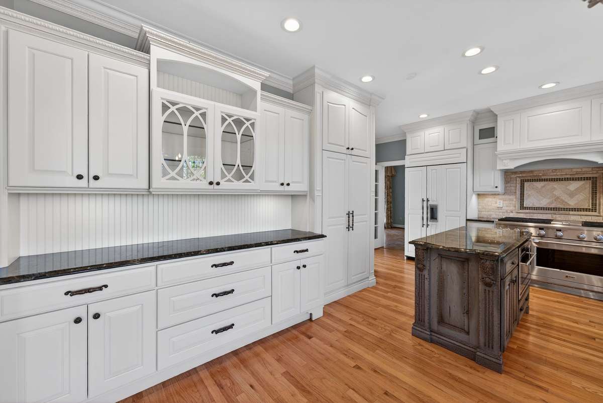 A built-in buffet enhances the kitchen with added storage and a perfect space for serving.