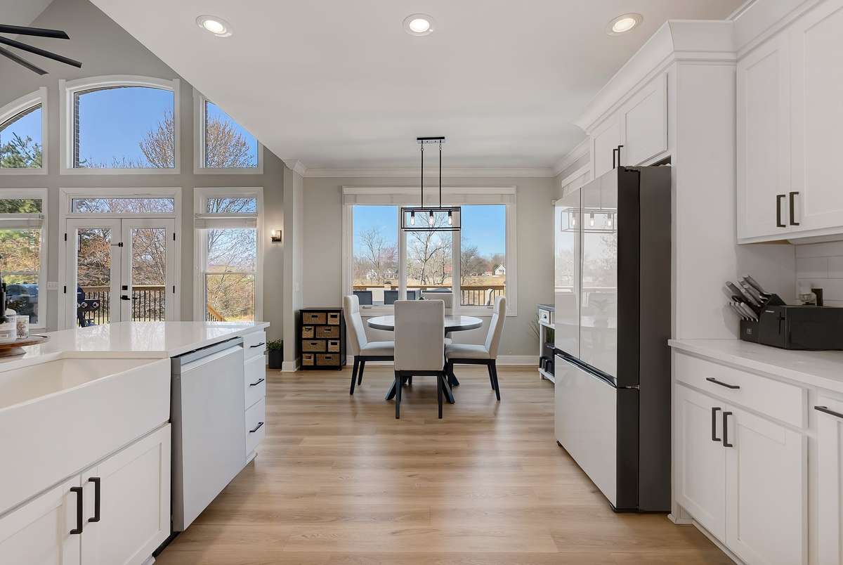 Bright kitchen with easy access to dining and living areas, offering excellent flow and visibility.