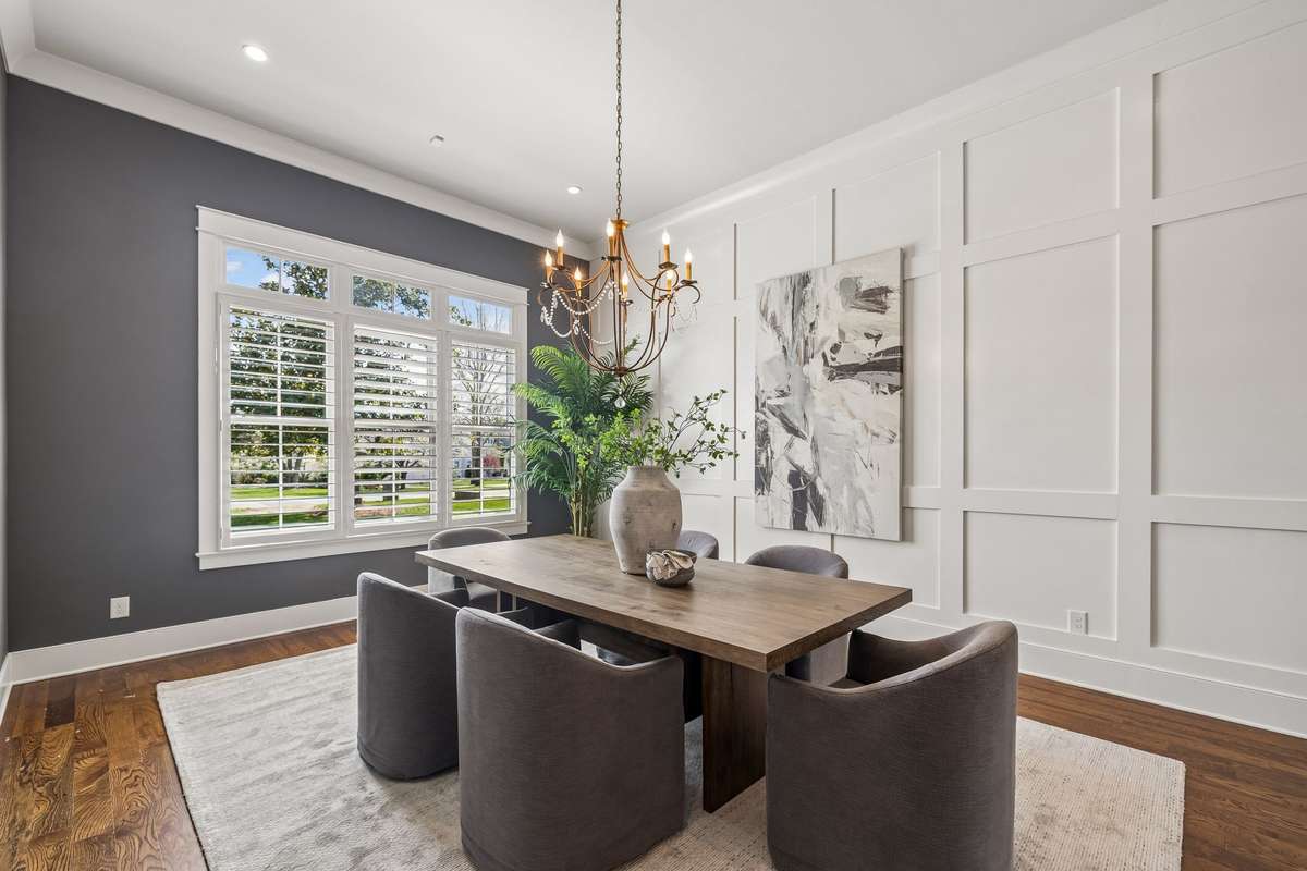 A formal dining room off the foyer is ready to host holidays and special occasions.