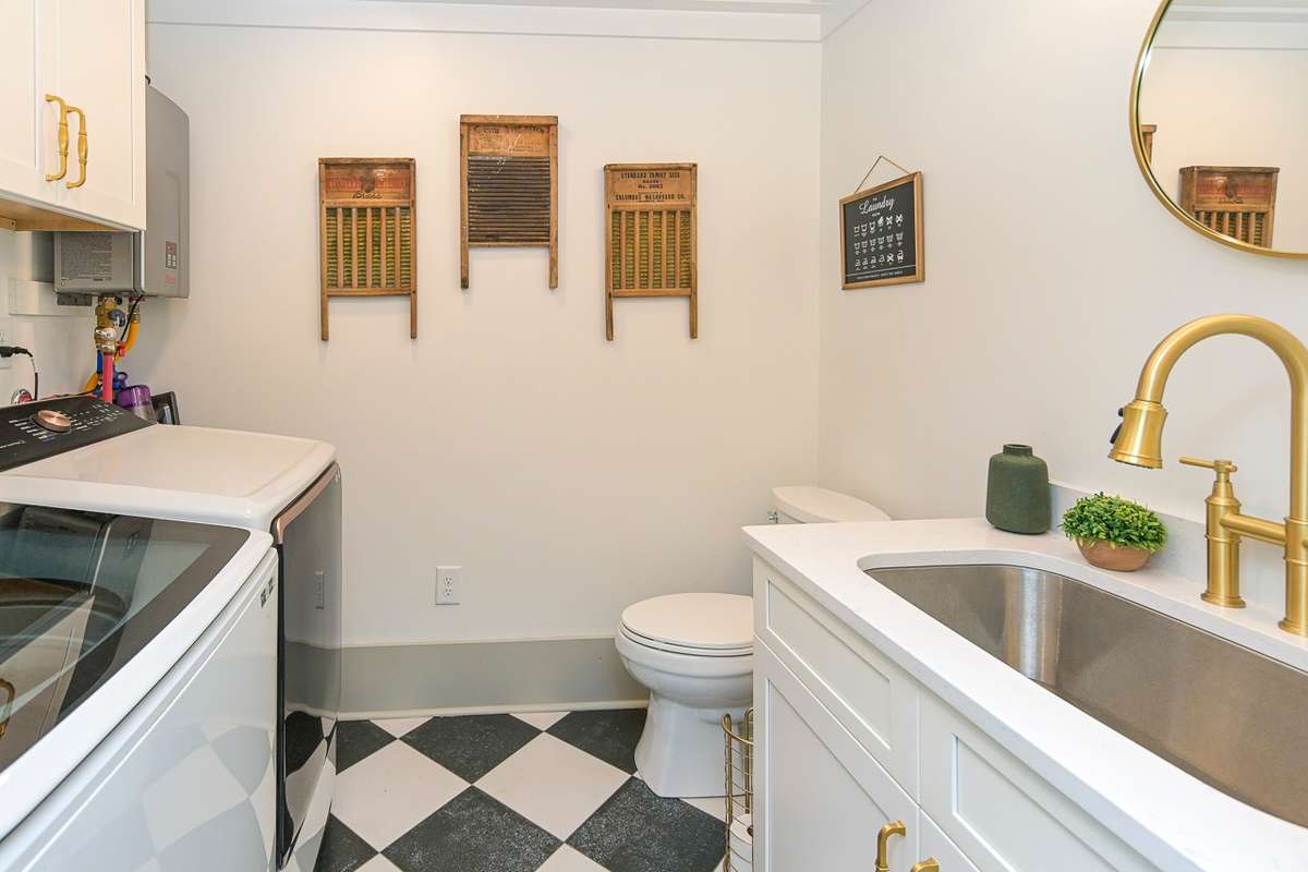 LAUNDRY & HALF BATH OFF KITCHEN OPENS TO SCREENED PORCH