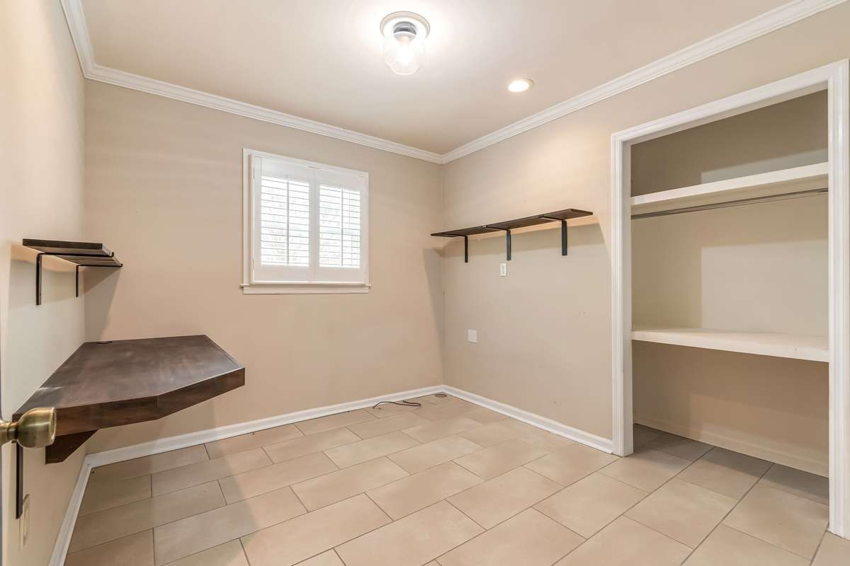 Landry or pantry room, washer/dryer hook up around the corner