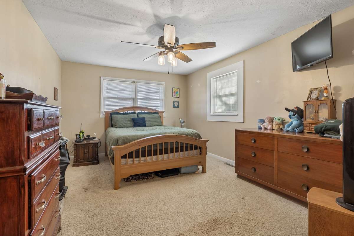 Primary bedroom with a private full bath! 380 Holiday Haven Rd, Smithville, TN 37166